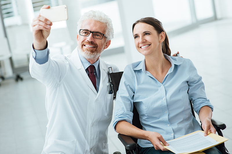 Doctor Taking Selfie with patient